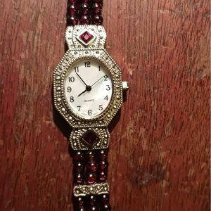 Silver and Red Ornate Watch with Crystal Accents